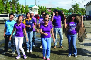 Some members of DSWD staff do the "hataw" as they join the culminating activities of the women's month celebration.  