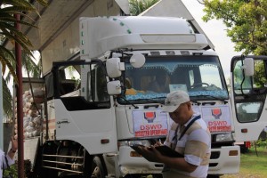 Mr. Neil Burgos of DSWD Caraga supply section leads the team who delivers the goods to Zamboanga City.