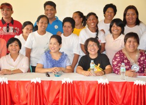 From left to right. Director Benilda Redaja of NPMO, Director Minda Brigoli of DSWD Caraga, Hon. Mayor Thelma Lamanilao of Sibagat, AdS and Ms.Malu Padua of World Bank, smiles with the volunteers at their backs for the picture taking during  the site visit at San Vicente Elementary School  in Sibagat.