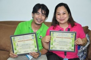(Photo Left)Regional Associate Statistician Cale Pineda and (right) Regional Field Coordinator Therese Margarette C. Babanto hold their plaques as first place in the Stat Quiz in the 24th National Statistics Month.