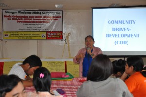 Ester Villamor, Regional Community Development Specialist of DSWD-Kalahi CIDSS Caraga, discusses about Community Driven Development (CDD) to Community Relations personnel of Silangan Mindanao Mining Company, Inc. (SMMCI). 
