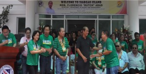 DSWD FO Caraga Regional Director Minda B. Brigoli, together with Hon. Florencio “ Butch” Abad, Secretary of the Department of Budget and Management ( in black shirt ) during the  Check  Turn over for newly funded SEA –K Associations. The Field Office handed in a total of Php 8, 850, 000. 00 through the different municipal mayors of the different municipalities in Surigao del Norte namely: Dapa (Php 1,900,000); Del Carmen (Php 1,550,000); Gen. Luna (Php 900,000); Pilar (Php 1,050,000); and Socorro (Php 3,450, 000).  The Check Turn- over was held during the Blessing and Inauguration of the Kapitolyo Nan Surigao on March 1, 2014, Dapa Surigao Island, Surigao del Norte. RD Brigoli was assisted by SLP Head Roy Serdeña (in pink shirt).