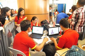 Workers of the Sustainable Livelihood program (SLP) print the photos of the applicants who availed the free printing services of the Department.