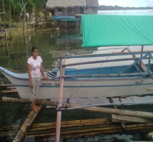 Mrs. Jessica I. Abensay with the tour boat, the latter suits the standards for tourism.