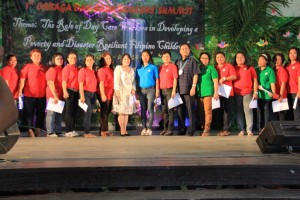 The re- elected Regional Federation of Day Care Worker Officers (RFDCWOs)  with RD Minda Brigoli and Asec. Teodulo Romo, Jr.