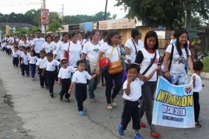Day Care Center Children with their parents joined the Awareness Walk. 