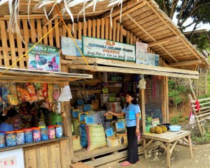 One proud member showing their temporary agrivet supply and general merchandise building. 