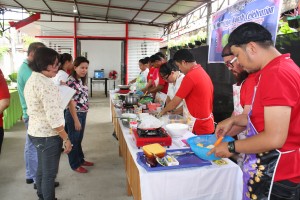 The cooking competition contestants are preparing nutritional meals as their entries for the Nutri-Saya Celebration.