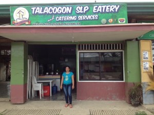 Neda Madiano happily entertain her customer at her association’s eatery. 