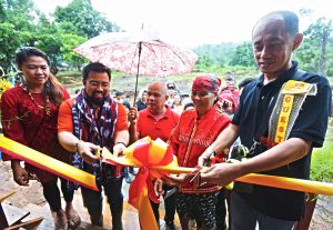 Brighter Future. DSWD Caraga GASSD Chief Ramel Jamen (right) and DepEd IPsEO  Coordinator Rozanno Rufino (left) lead the ribbon-cutting rites during the turn-over and inauguration ceremony of the 1 unit and 2 classroom sub-project of Sitio Durian. The sub-project is the first of the 251 schools for lumads granted to the regions of Mindanao which was built and completed to accommodate and address the needs of lumad children in the area. 